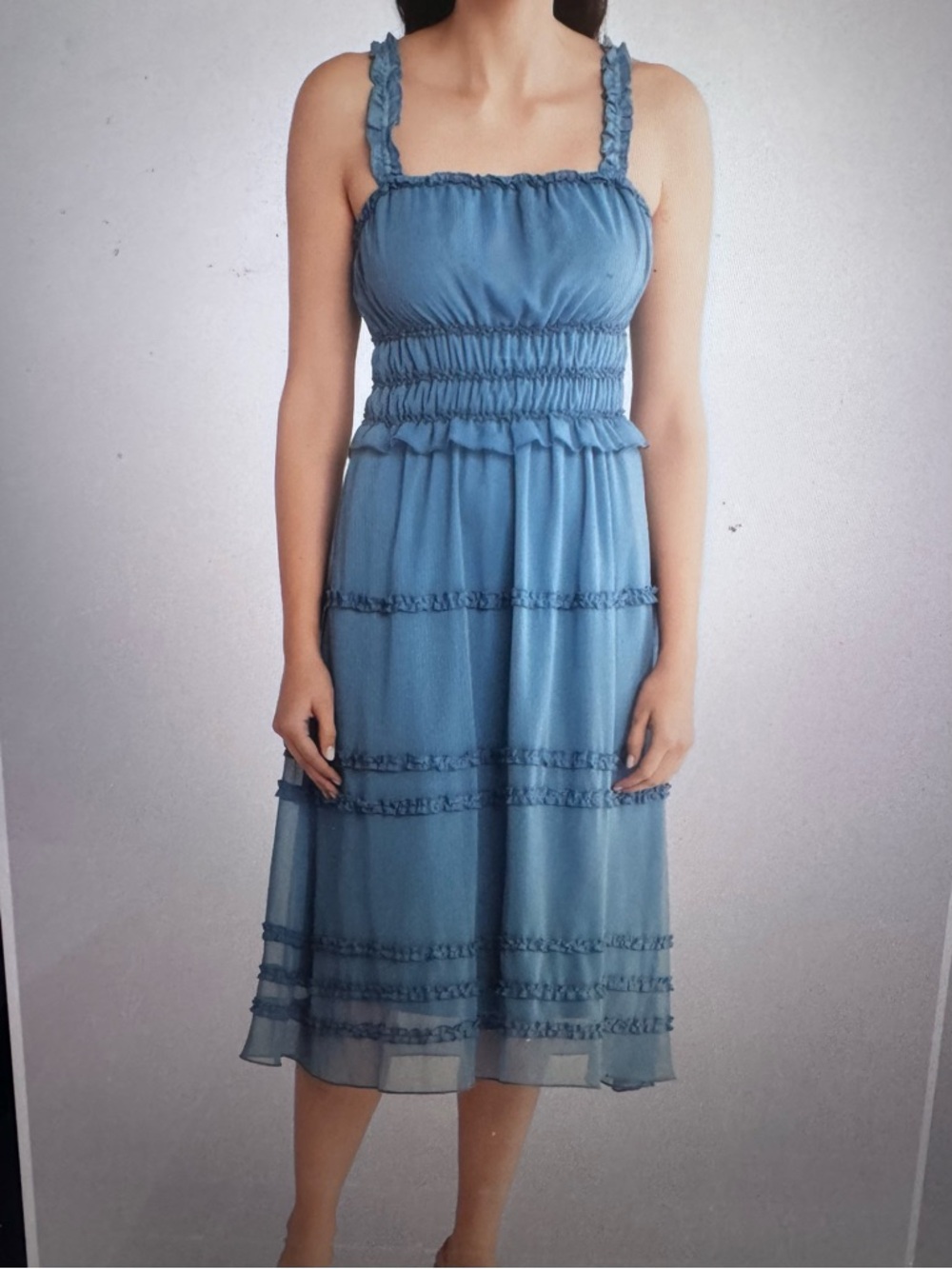 Soft blue sleeveless midi dress with a romantic, flowy silhouette. Size M